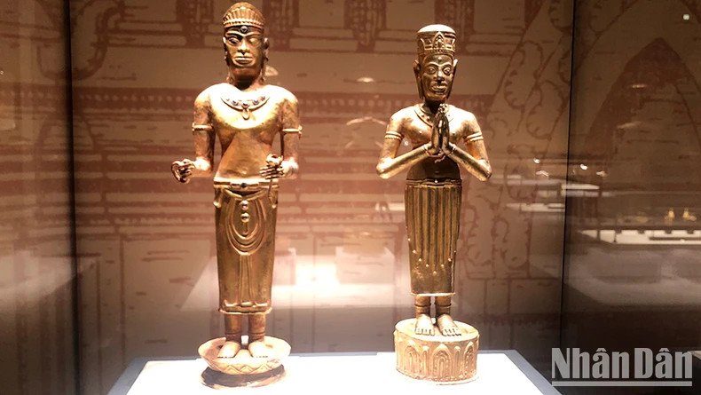 Male and female deity statues