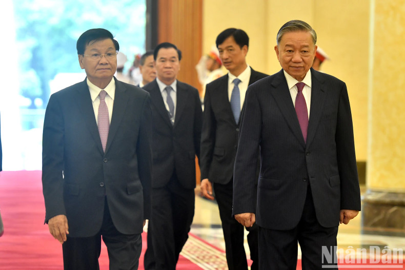 Party General Secretary and President To Lam and General Secretary of the LPRP and President of Laos Thongloun Sisoulith. Party General Secretary and President To Lam and General Secretary of the LPRP and President of Laos Thongloun Sisoulith.