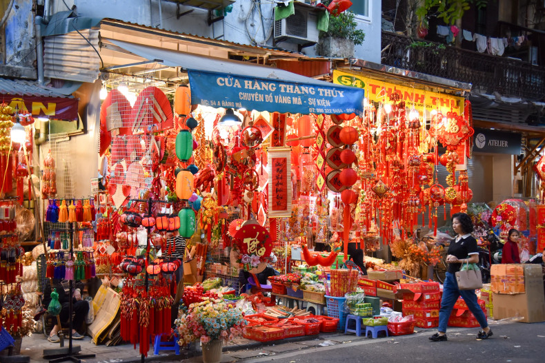 These days, Hang Ma Street is wearing its typical red shirt with traditional decorations for Tet. These days, Hang Ma Street is wearing its typical red shirt with traditional decorations for Tet.