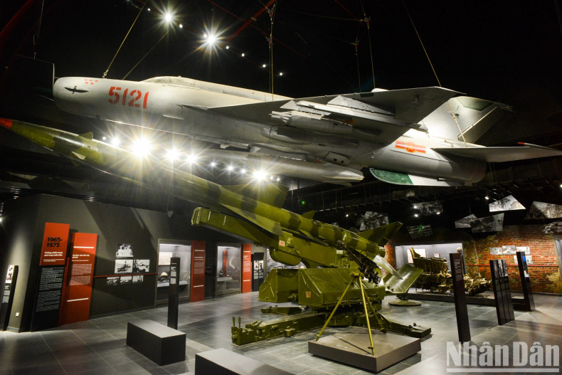 The exhibition area is dedicated to the national treasure of the MiG-21 aircraft numbered 5121 and various air defence systems that contributed to the "Hanoi-Dien Bien Phu in the Air" Victory in December 1972. Lieutenant General People's Armed Forces Hero Pham Tuan piloted this MiG-21 and shot down a B-52 bomber on the night of December 27, 1972. This aircraft was responsible for shooting down five American planes, with pilots Dinh Ton and Vu Dinh Rang also having flown it.
