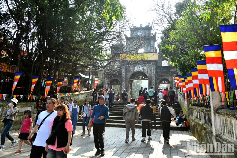 People excitedly attend the Huong Pagoda Festival.