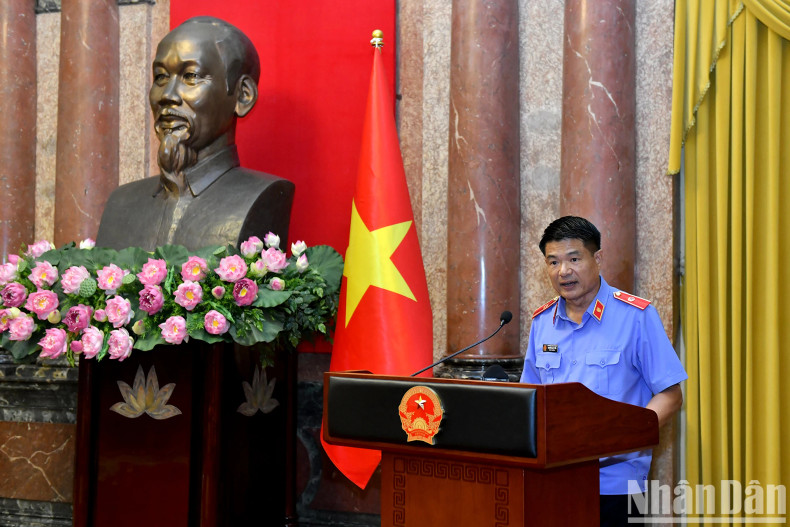 Prosecutor General of the Supreme People's Procuracy Nguyen Huy Tien speaks at the event.