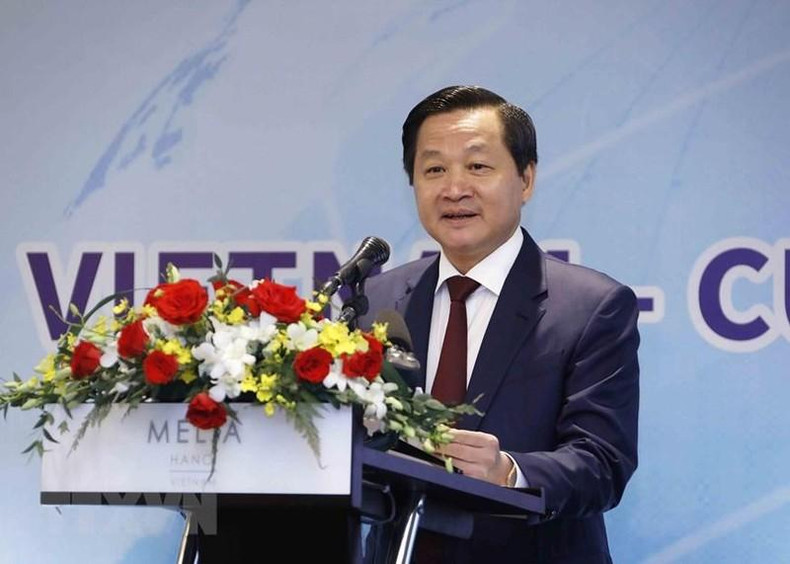 Deputy PM Le Minh Khai speaks at the forum. (Photo: VNA)