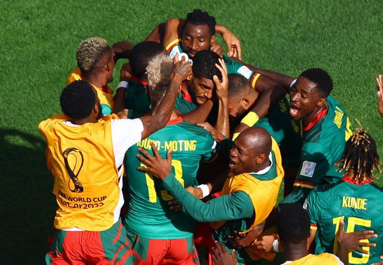 Cameroon's Jean-Charles Castelletto celebrates scoring their first goal with teammates. (Photo: REUTERS)