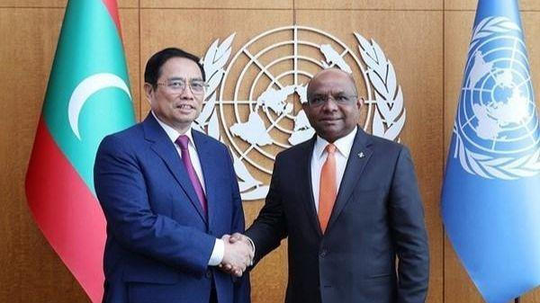 Prime Minister Pham Minh Chinh (L) meets President of the UN General Assembly Abdulla Shahid in New York on May 16, 2022 (Photo: VNA)