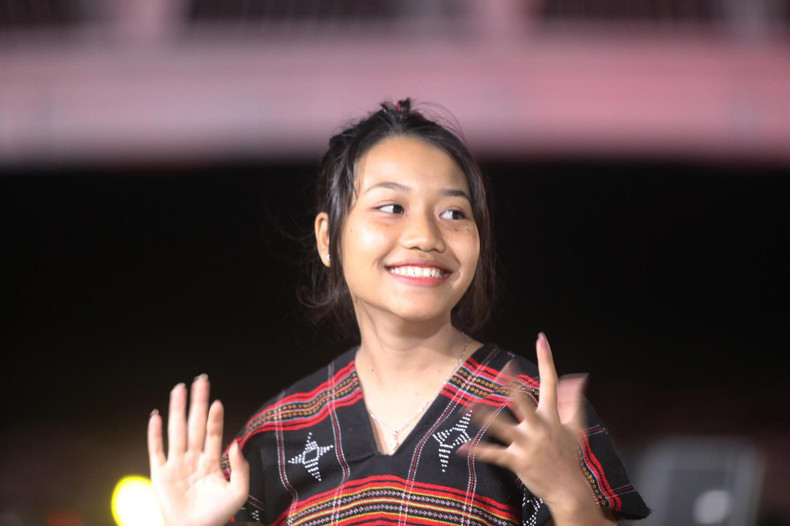 The smile of a girl participating in the performance