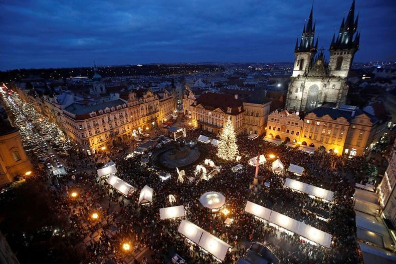 The traditional Christmas market in the Old Town Square in Prague, Czech Republic, attracts large numbers of visitors. (Photo: Reuters)