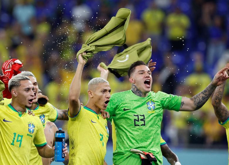 Brazil's Richarlison and Ederson celebrate after their match against Switzerland. (Photo: REUTERS)