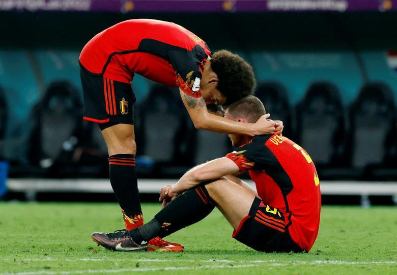 Belgium's Axel Witsel and Jan Vertonghen look dejected after the match as Belgium are eliminated from the World Cup. (Photo: REUTERS)