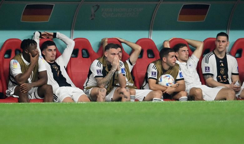 Germany players look dejected after the match as Germany are eliminated from the World Cup. (Photo: REUTERS)