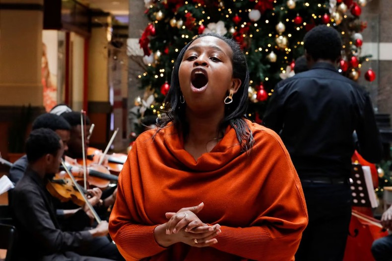 Artists from the Nairobi Philharmonic Orchestra perform at the Galleria shopping mall in Nairobi, Kenya, December 11, 2022. (Photo: Reuters)