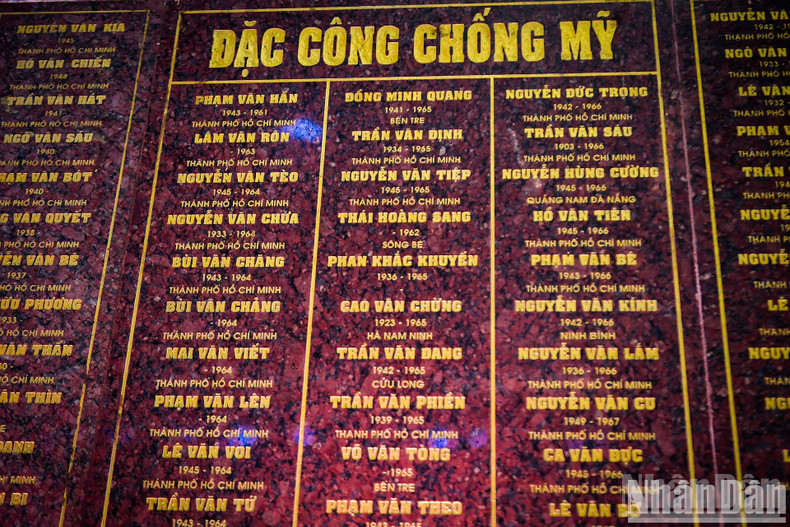 Inside the Ben Dược Martyrs’ Memorial Temple at the Cu Chi Tunnels, granite walls bear the engraved names of heroic martyrs who sacrificed their lives for the nation. More than 45,600 names are etched into the temple walls, honouring Heroic Vietnamese Mothers, national heroes, and martyrs from across the country. Inside the Ben Dược Martyrs’ Memorial Temple at the Cu Chi Tunnels, granite walls bear the engraved names of heroic martyrs who sacrificed their lives for the nation. More than 45,600 names are etched into the temple walls, honouring Heroic Vietnamese Mothers, national heroes, and martyrs from across the country.