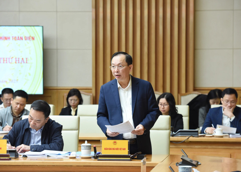 Deputy Governor of the State Bank of Vietnam Dao Minh Tu speaks at the meeting. Deputy Governor of the State Bank of Vietnam Dao Minh Tu speaks at the meeting.