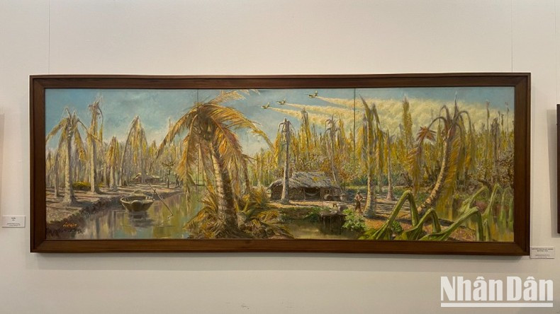 The painting "Agent Orange" by the late painter Le Lam is showcased at the exhibition. (Photo: HUY LE)