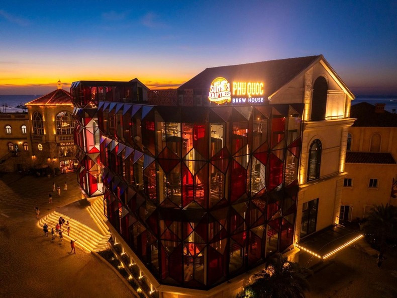 Phu Quoc Brew House shines brightly in the warm hues of the sunset. Phu Quoc Brew House shines brightly in the warm hues of the sunset.