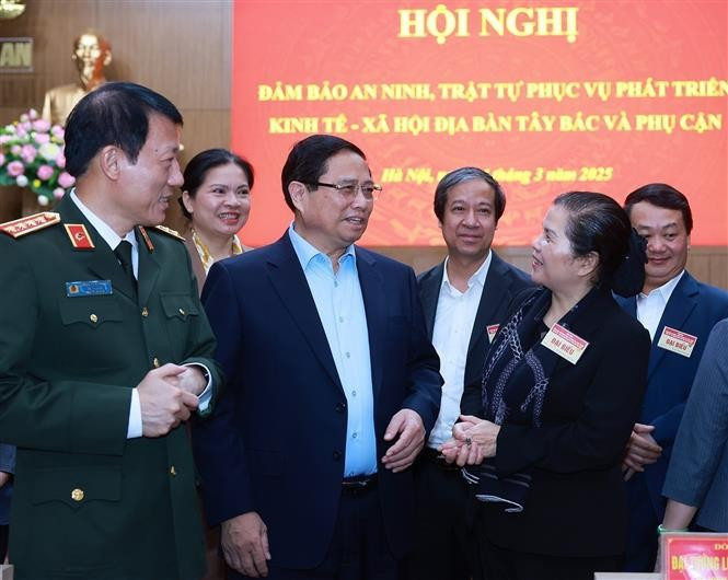 Prime Minister Pham Minh Chinh and delegates at the conference. (Photo: VNA)
