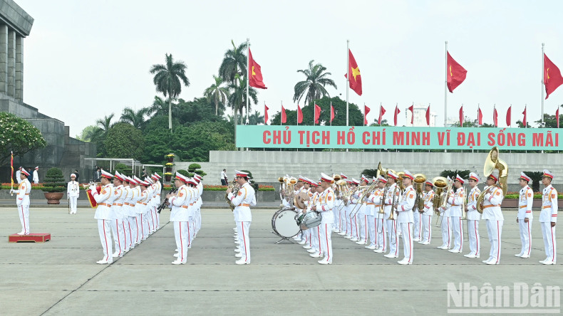 At Ba Dinh Square, the military band performs ceremonial honours as part of the event.