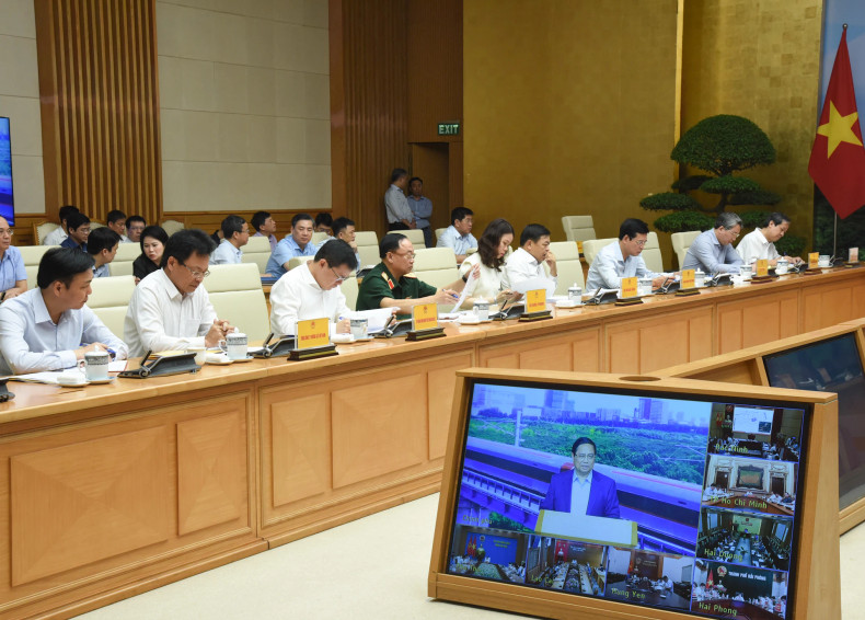 Delegates attend the meeting.