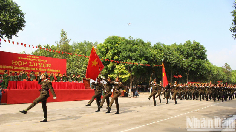 The male People's Security officers conduct their rehearsal. The male People's Security officers conduct their rehearsal.