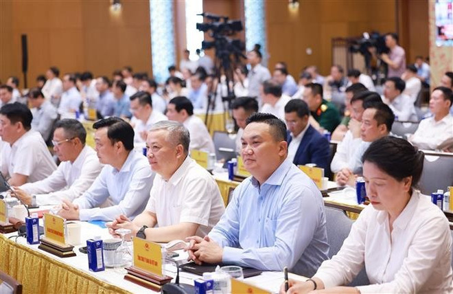 Participants at the online national conference on boosting public investment as a key driver of economic growth in 2025. (Photo: VNA)