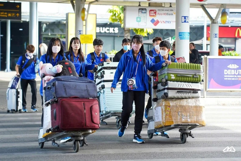 The female players are on their way to catch a flight to Myanmar.
