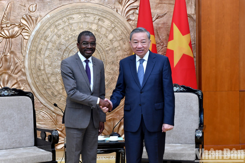 Party General Secretary To Lam and Director of the UNESCO World Heritage Centre Lazare Eloundou Assomo.