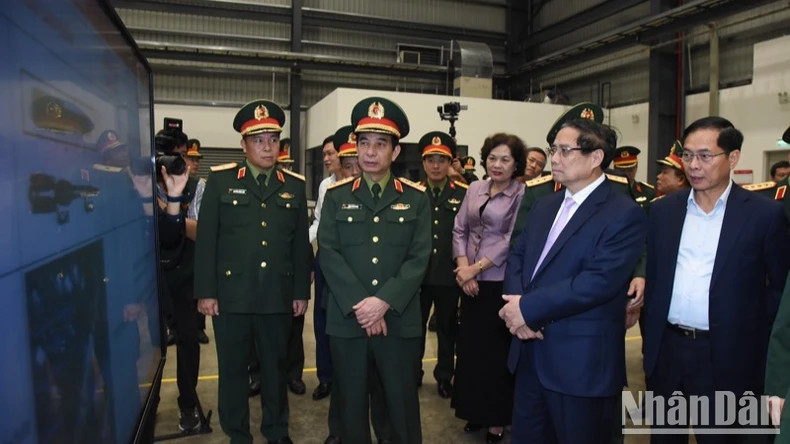 PM Pham Minh Chinh visits the Viettel Military Industry and Telecoms Group. (Photo: NDO) PM Pham Minh Chinh visits the Viettel Military Industry and Telecoms Group. (Photo: NDO)