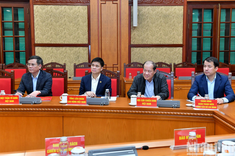 The delegates attend the session.