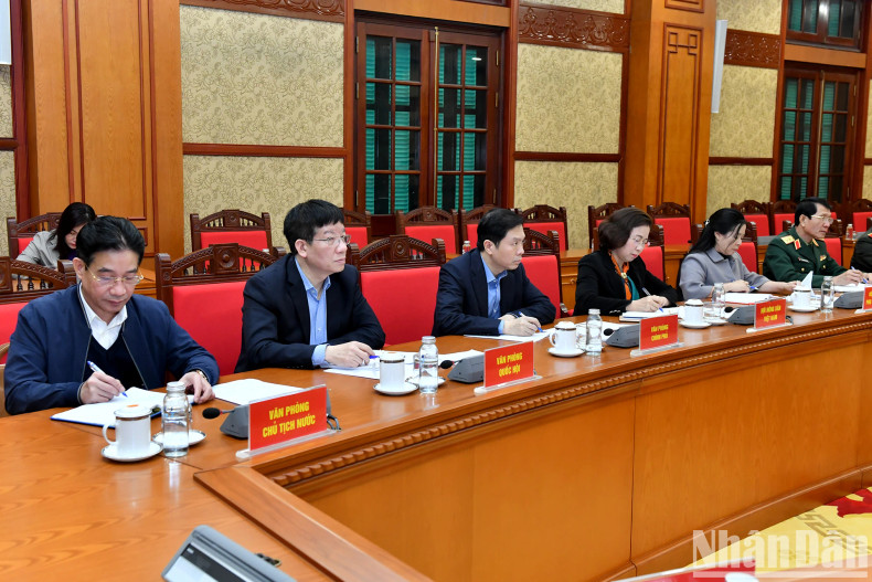 The delegates attend the session.