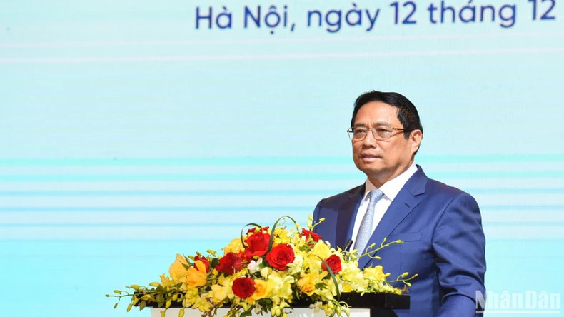Prime Minister Pham Minh Chinh speaks at Vietnam-Cambodia investment and trade promotion forum (Photo: NDO)