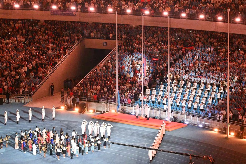 The Cambodian flag-raising ritual at the opening ceremony of the 32nd SEA Games, at Morodok Techo Stadium in Phnom Penh.