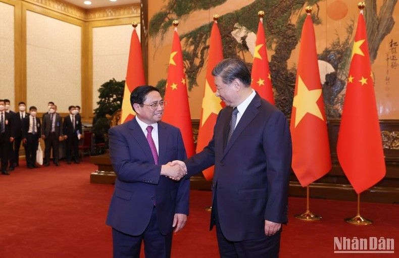 Prime Minister Pham Minh Chinh and Party General Secretary and President of China Xi Jinping. (Photo: NDO)
