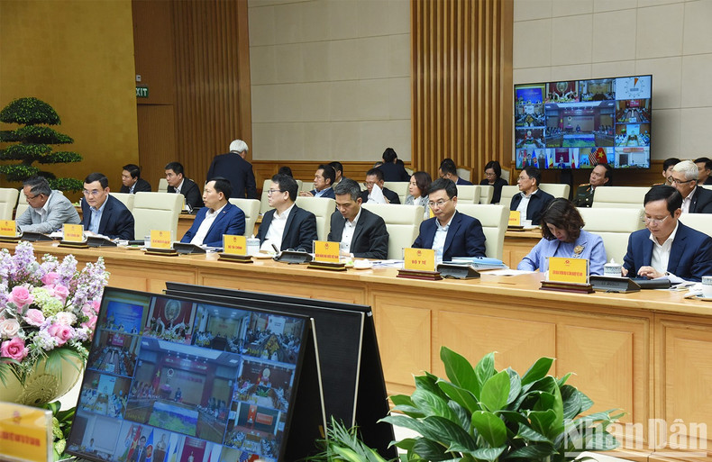 The delegates attend the conference in Hanoi.