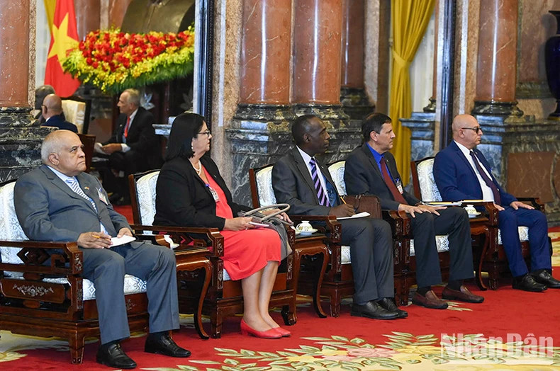 Cuban delegates attend the reception.