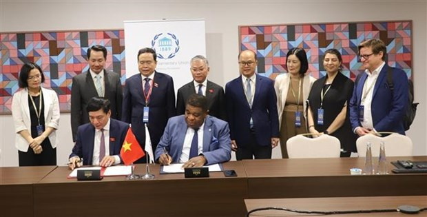 At the signing ceremony of the agreement (Photo: VNA)
