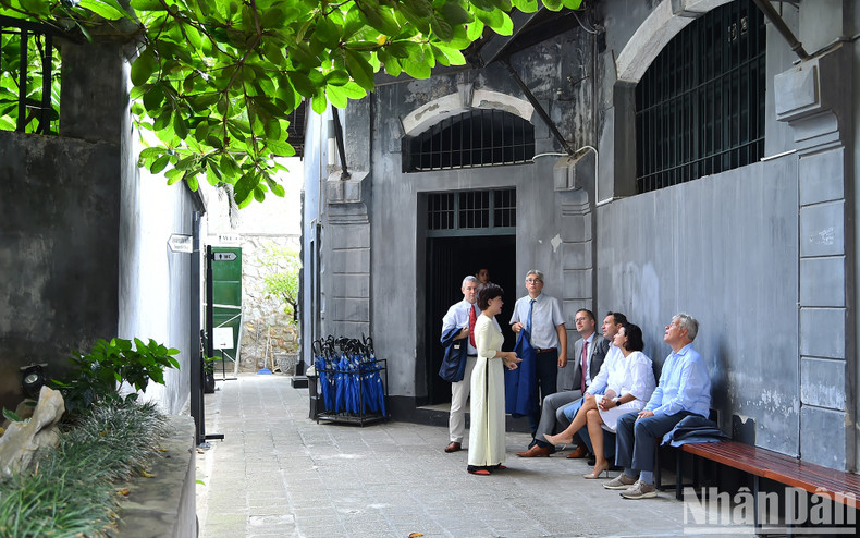 President of the Belgian Senate Stephanie D'Hose and members of the delegation listen to explanations and introductions about Hoa Lo Prison Relic Site.