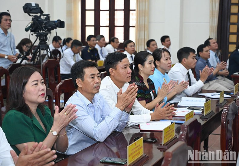Delegates attend the session.
