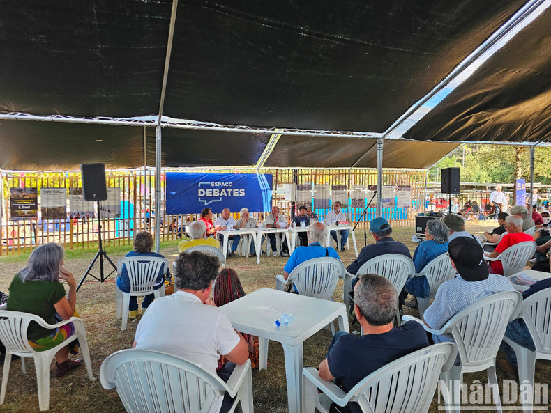 International delegates attend a conference on global challenges and the struggle for peace.