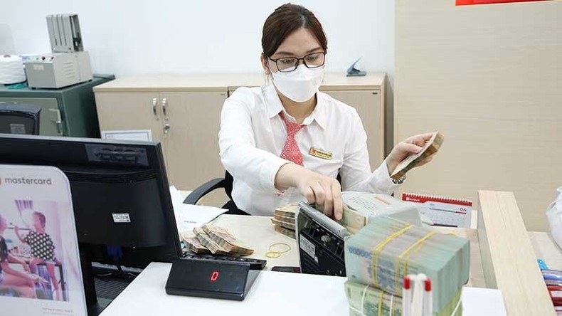According to experts, there is still a huge gap between lending rates and deposit rates-operating rates. (Illustration image: HONG ANH)