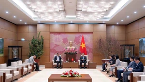 At a working session between General Secretary of the National Assembly (NA) and Chairman of the NA Office Le Quang Manh and Secretary General of the Jordanian House of Representatives Awwad A. O. Alghuwairi in Ha Noi on February 2. (Photo: daibieunhandan.vn)