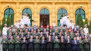State President Luong Cuong and delegates attending the ceremony on November 4 to present appointment and promotion decisions to the military officers. (Photo: VNA)