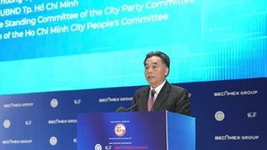 Vice Chairman of the municipal People’s Committee Nguyen Loc Ha speaks at the event. (Source: VGP)