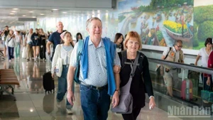 Passengers complete aviation procedures, preparing to board the aircraft.