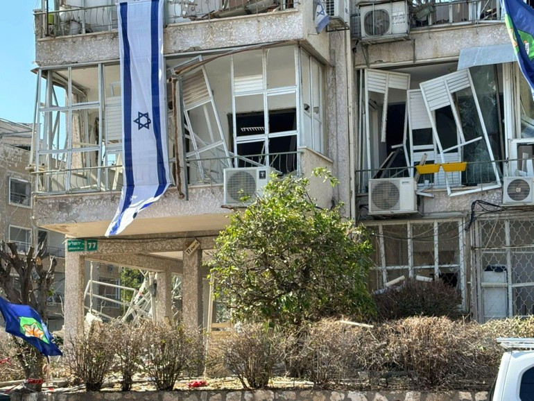 All the glass windows of Thuy's building were shattered by the blast of a bomb that fell 100 meters away. (Photo courtesy of Nguyen Thi Thuy) nhachithuy3.jpg