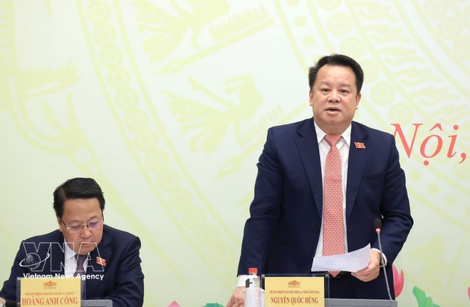 Nguyen Quoc Hung (right), Vice Chairman of the National Assembly (NA)’s Committee for National Defence, Security and Foreign Affairs, speaks at teh press conference. (Photo: VNA)