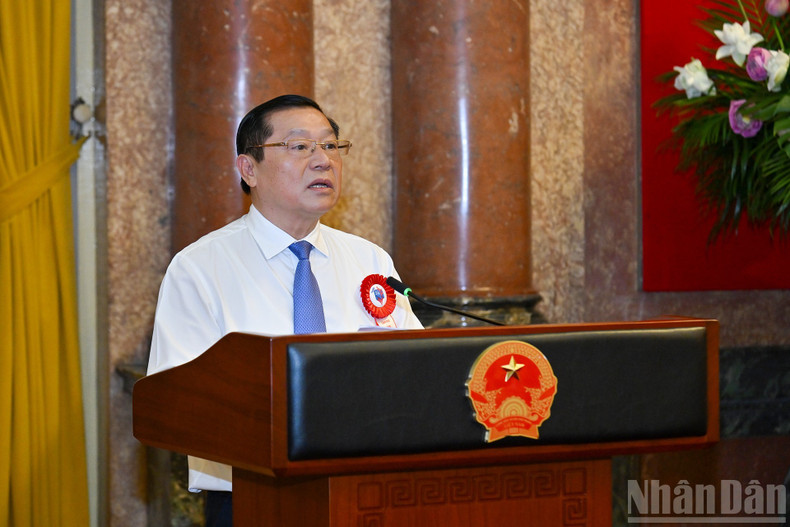 Permanent Deputy Head of the PCC Commission for Communication, Education and Mass Mobilisation Lai Xuan Mon deliverers a report at the meeting.