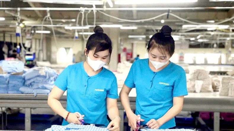 Female workers at a production facility under the Ha Noi Textile and Garment Corporation (Hanosimex). 18080a17a9ac1af243bd-6110-5881-1738-131.jpg