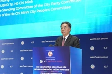 Vice Chairman of the municipal People’s Committee Nguyen Loc Ha speaks at the event. (Source: VGP)