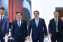 rime Minister Pham Minh Chinh arriving at the opening session of the 16th Annual Meeting of the World Economic Forum (WEF) in Tianjin city of China (Photo: VNA)