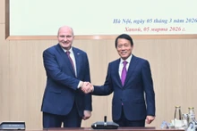 Vietnamese Minister of Public Security General Luong Tam Quang (R) meets with Russian Minister of Emergency Situations Aleksandr Kurenkov on March 5. (Photo: bocongan.gov.vn)